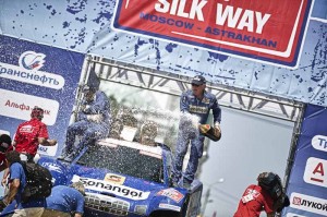 SIlk Way Rally 2013 - Jean-Louis Schlesser (driver) and Konstantin Zhiltsovr (co-driver) celebrate their 1st place after the 7th stage of Silk Way Rally from Moscow to Astrakhan, Russia on July 13th, 2013 // Denis Klero/Red Bull Content Pool // P-20130715-00344 // Usage for editorial use only // Please go to www.redbullcontentpool.com for further information. //